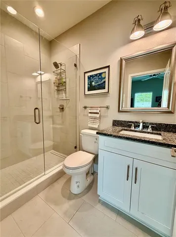 a view of an empty room and wooden floor