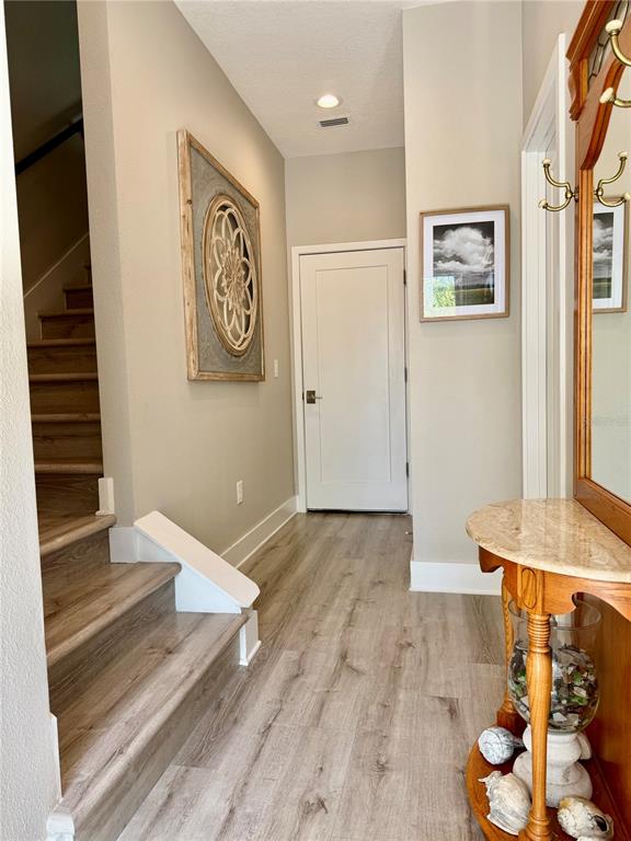 946 Highland Avenue Dunedin, FL 34698 - Photo 15 of 45 a view of an empty room and wooden floor