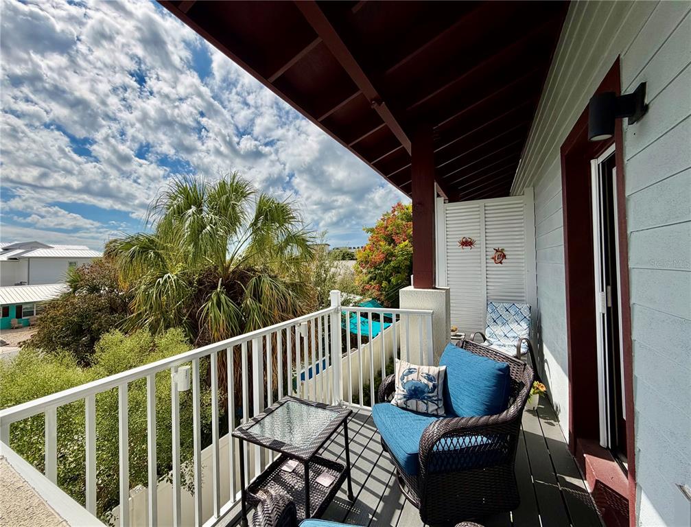 946 Highland Avenue Dunedin, FL 34698 - Photo 24 of 45 a view of balcony with furniture