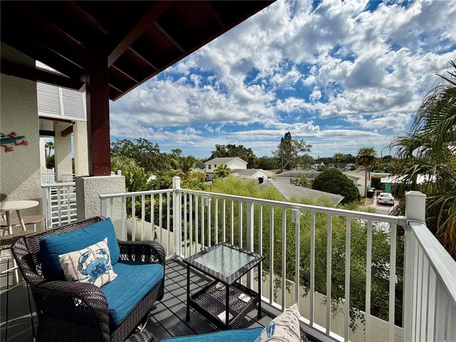 a bathroom with a granite countertop toilet sink and a mirror