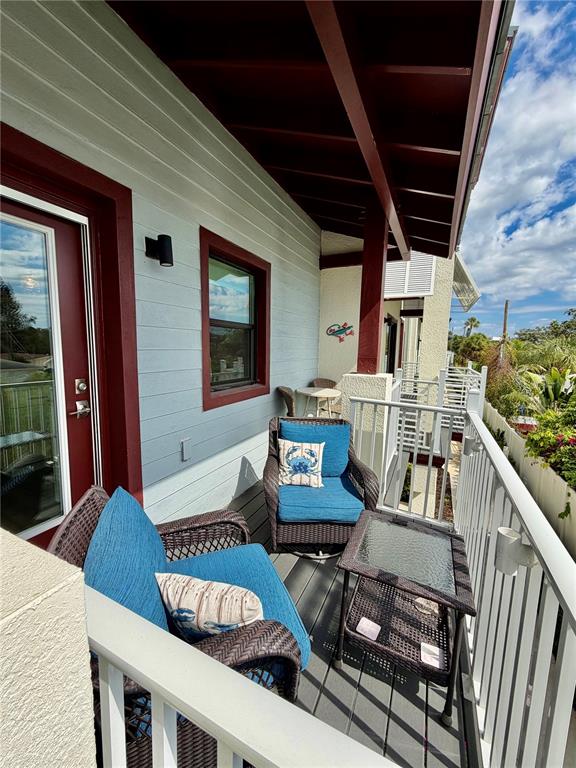 946 Highland Avenue Dunedin, FL 34698 - Photo 27 of 45 a living room with furniture and a large window