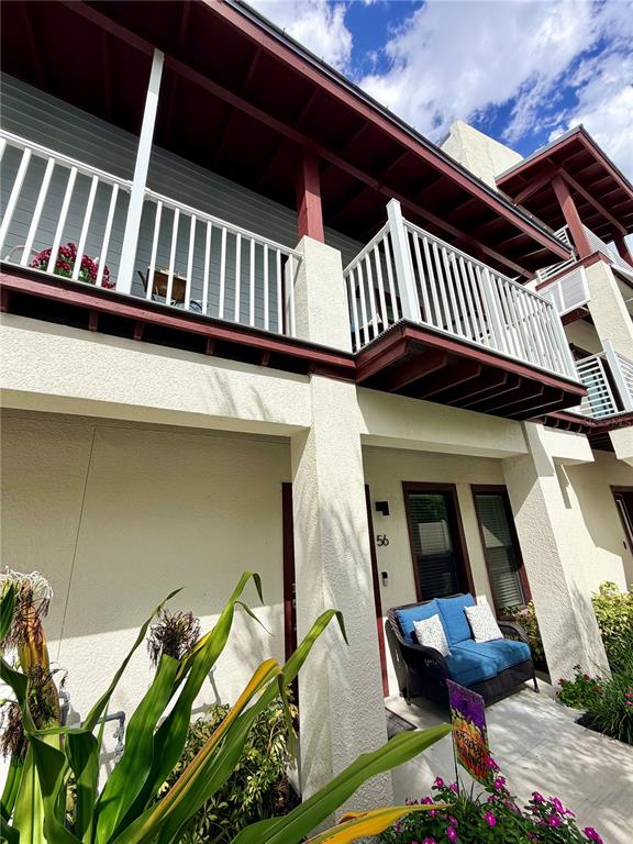 946 Highland Avenue Dunedin, FL 34698 - Photo 3 of 45 a view of front door of house with outdoor seating