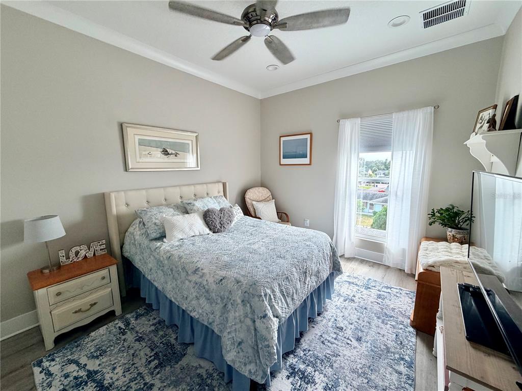 946 Highland Avenue Dunedin, FL 34698 - Photo 35 of 45 a bed room with bed and a window