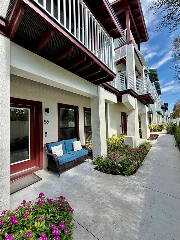 946 Highland Avenue Dunedin, FL 34698 - Photo 5 of 45 a view of a building with sitting area
