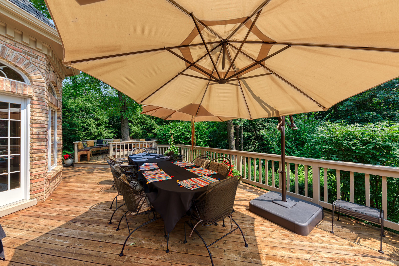 136 Circle Ridge Drive Burr Ridge, IL 60527 - Photo 9 of 38 a view of a dinning table and chairs on the deck