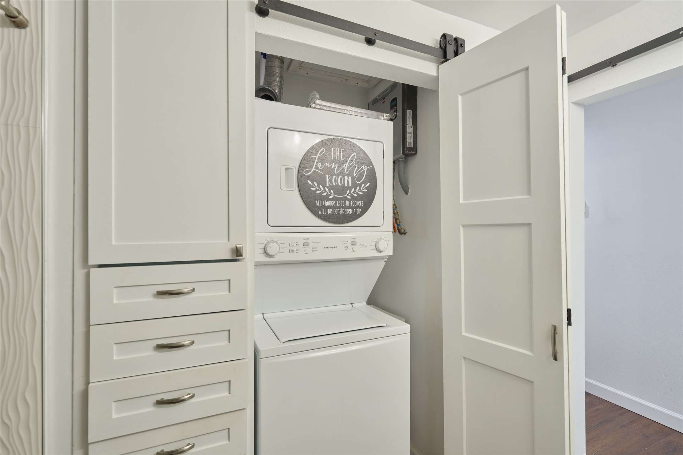 801 River Road, Unit E111 Montgomery, TX 77356 - Photo 16 of 26 Washer/dryer combo in bathroom