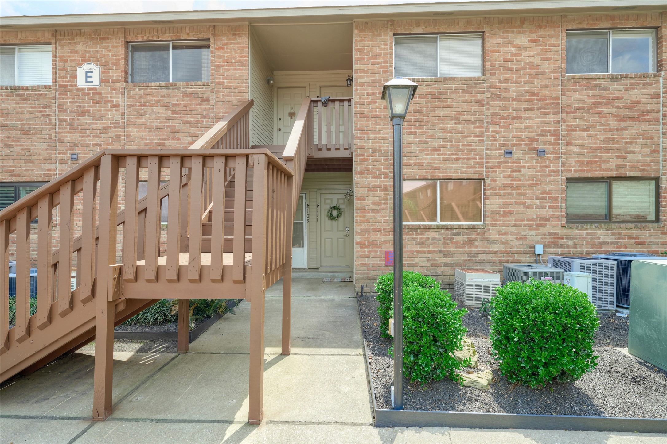 801 River Road, Unit E111 Montgomery, TX 77356 - Photo 20 of 26 Roof is approx. 3 years old and is HOA responsibility as well as exterior maintenance. The exterior is being painting & is almost complete. Well maintained gated complex with boat slips.
