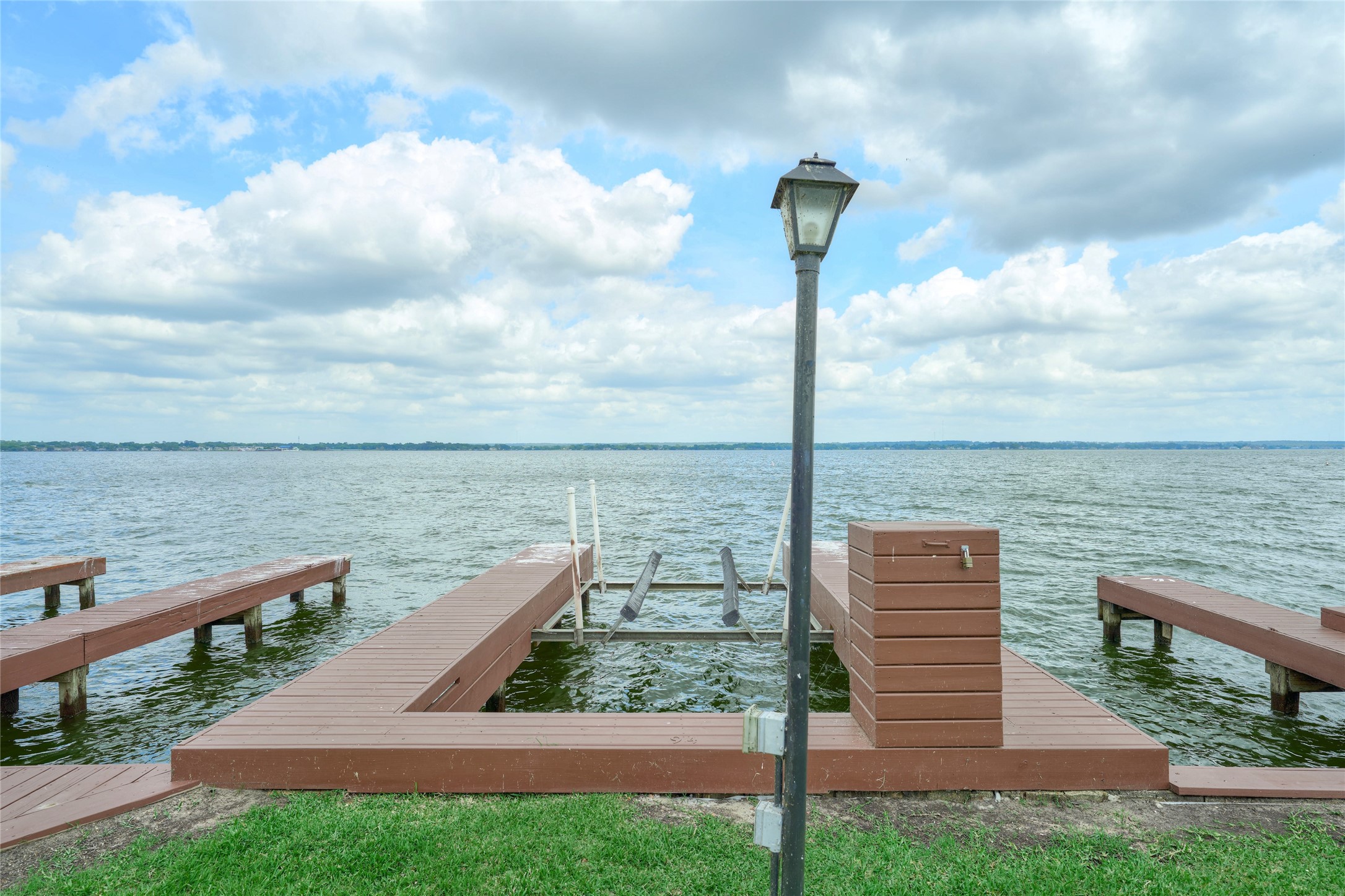 801 River Road, Unit E111 Montgomery, TX 77356 - Photo 24 of 26 Close up of boat slip #94 with lift.