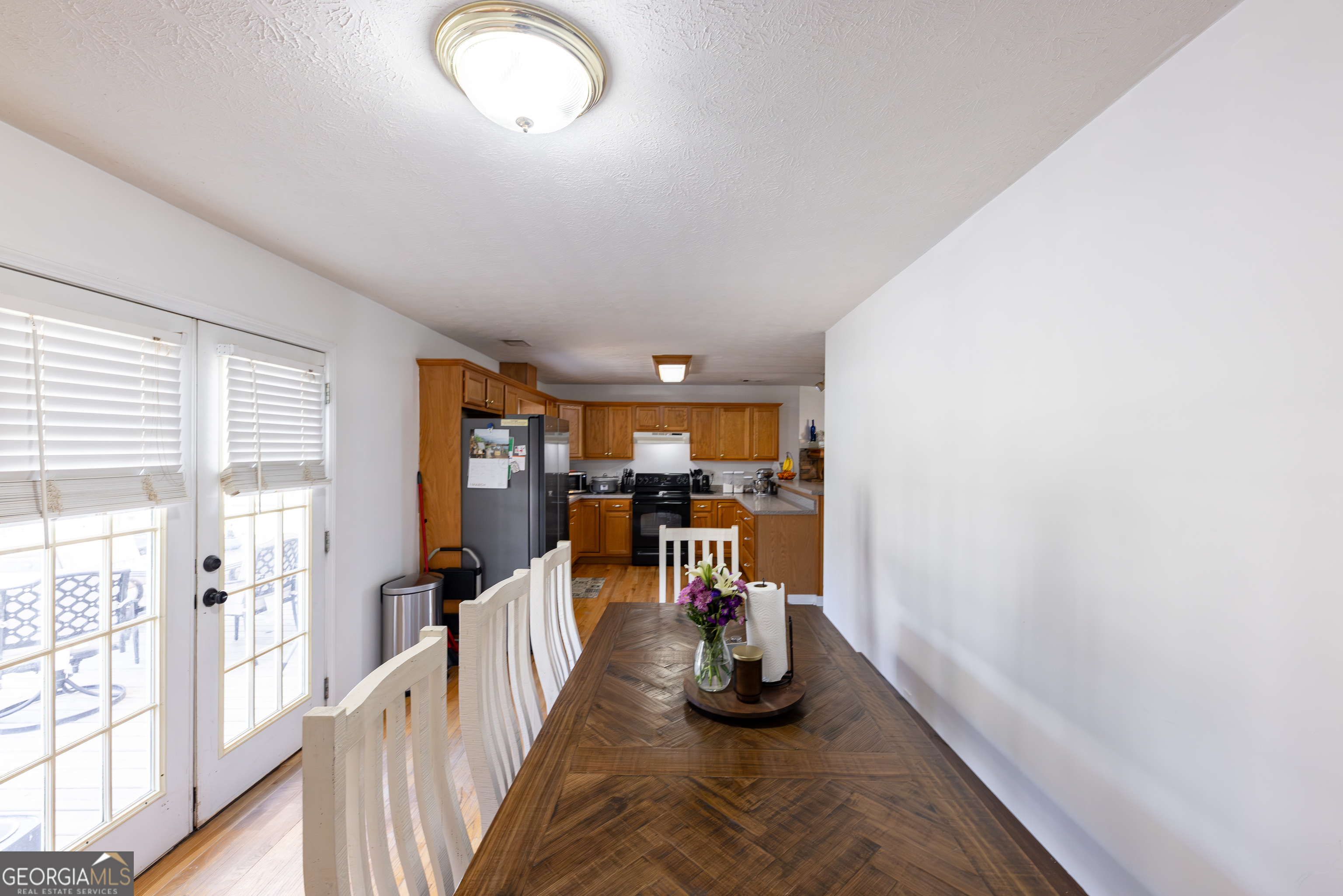 647 Pine Valley Road Meansville, GA 30256 - Photo 12 of 92 a view of a living room and dining room