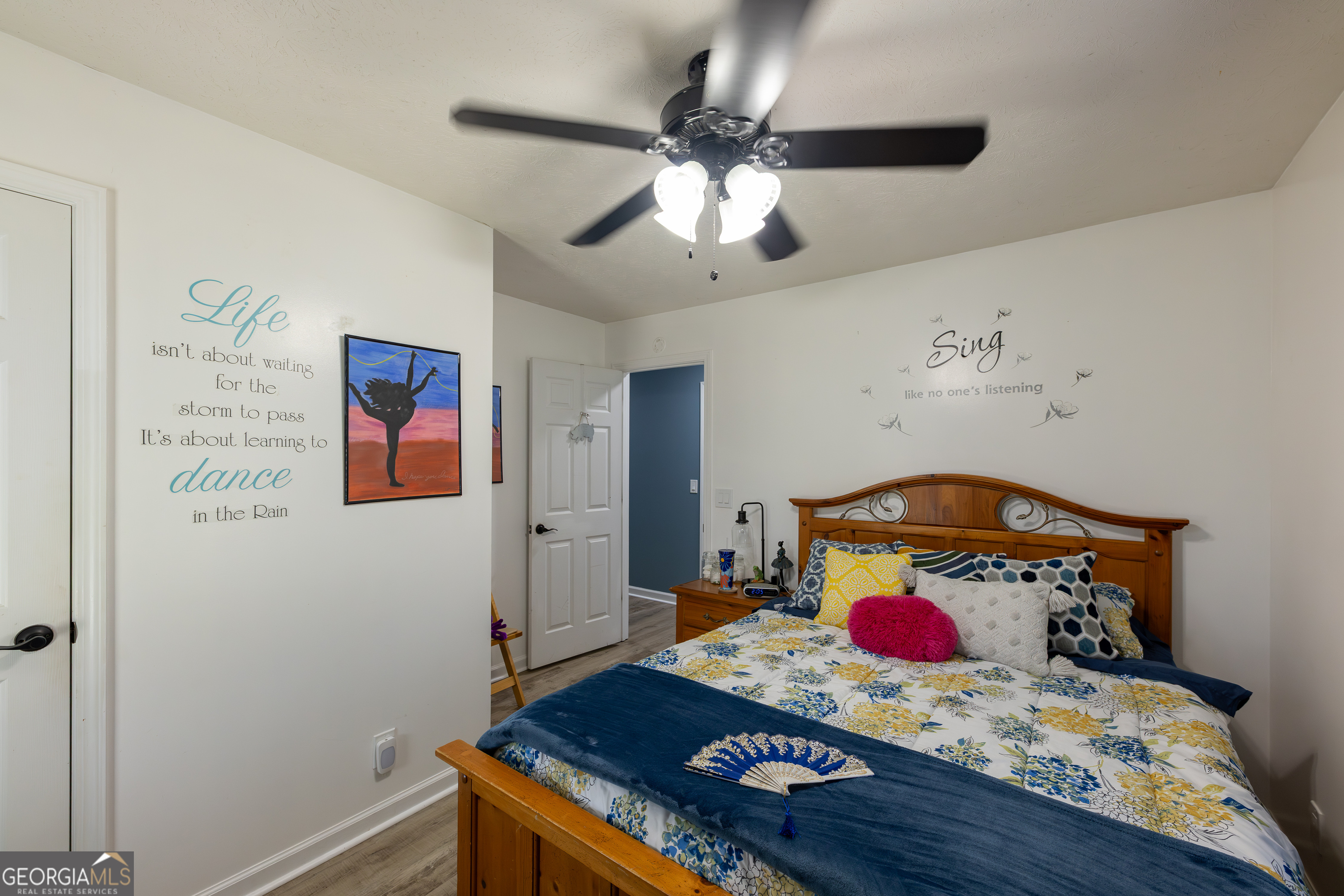 647 Pine Valley Road Meansville, GA 30256 - Photo 19 of 92 a living room with furniture and a wooden floor