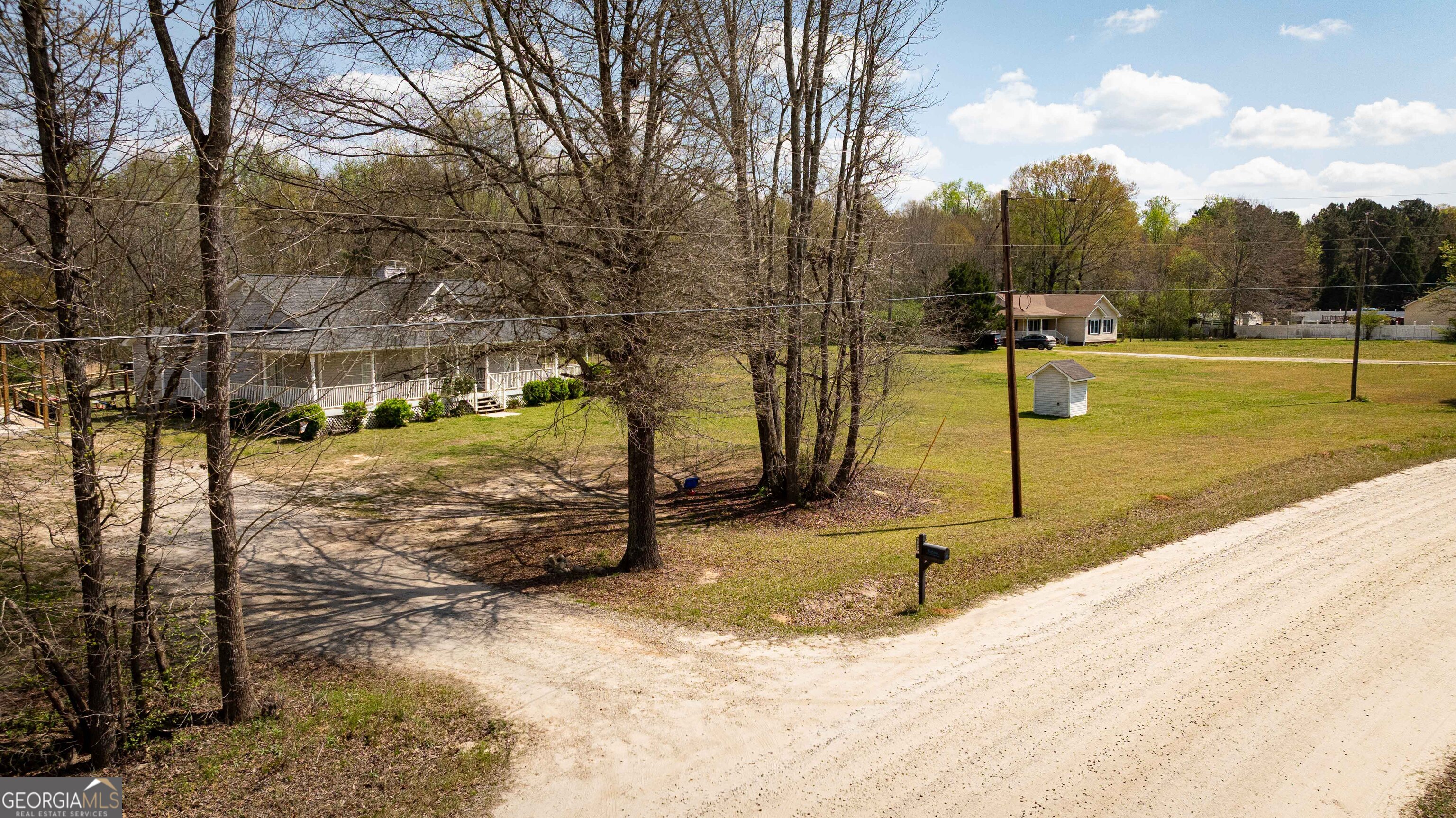 647 Pine Valley Road Meansville, GA 30256 - Photo 51 of 92 a view of a park with swings