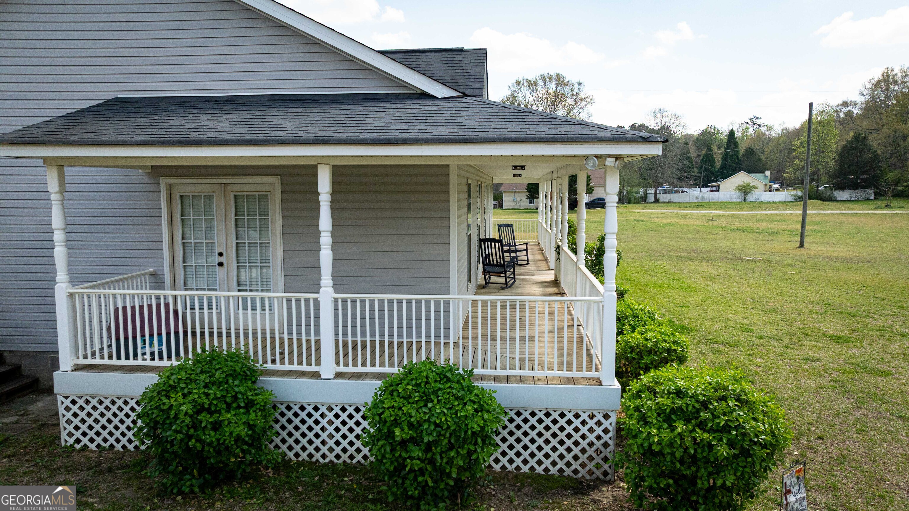 647 Pine Valley Road Meansville, GA 30256 - Photo 62 of 92 a view of a house with a yard