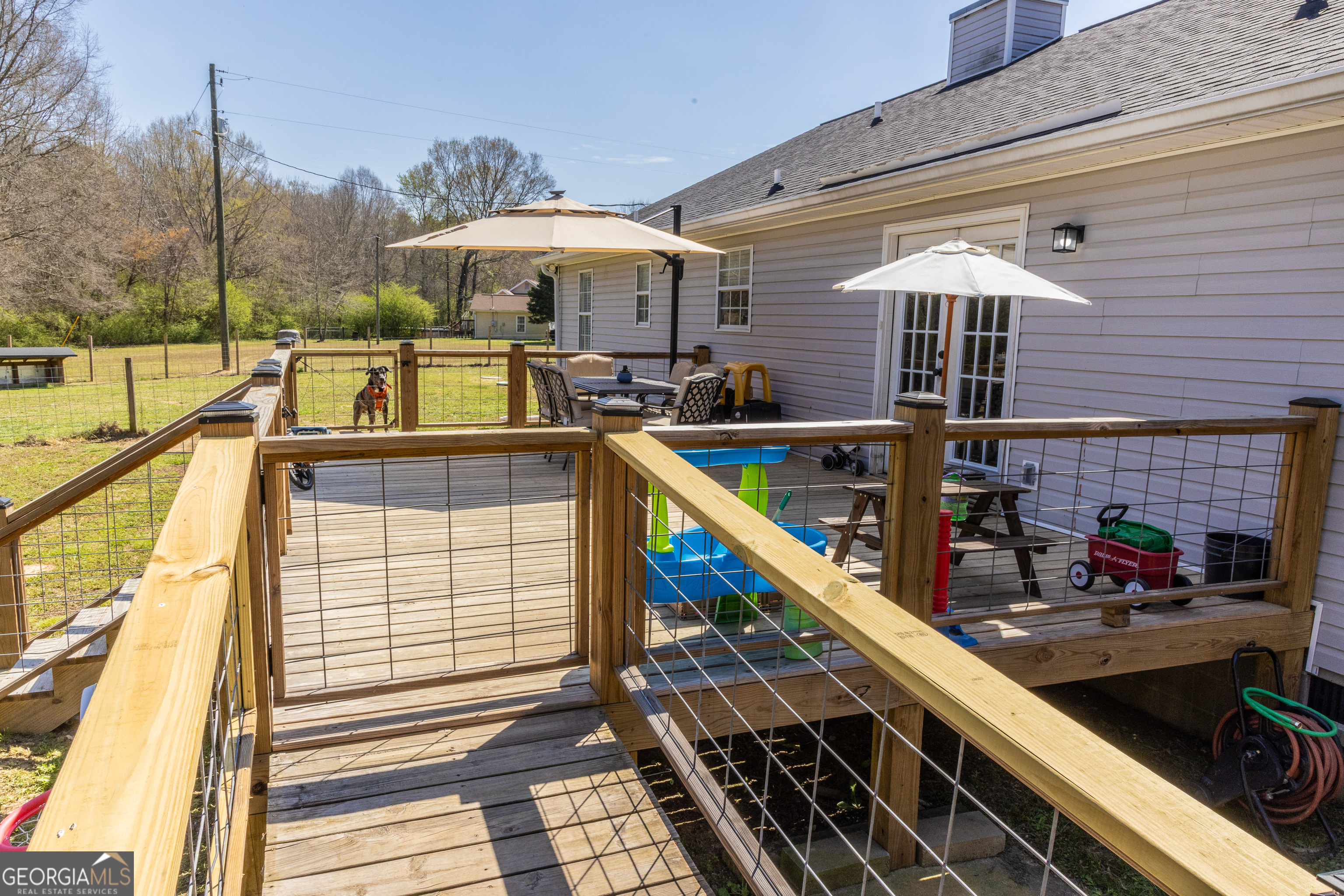 647 Pine Valley Road Meansville, GA 30256 - Photo 72 of 92 a view of a patio with a table and chairs