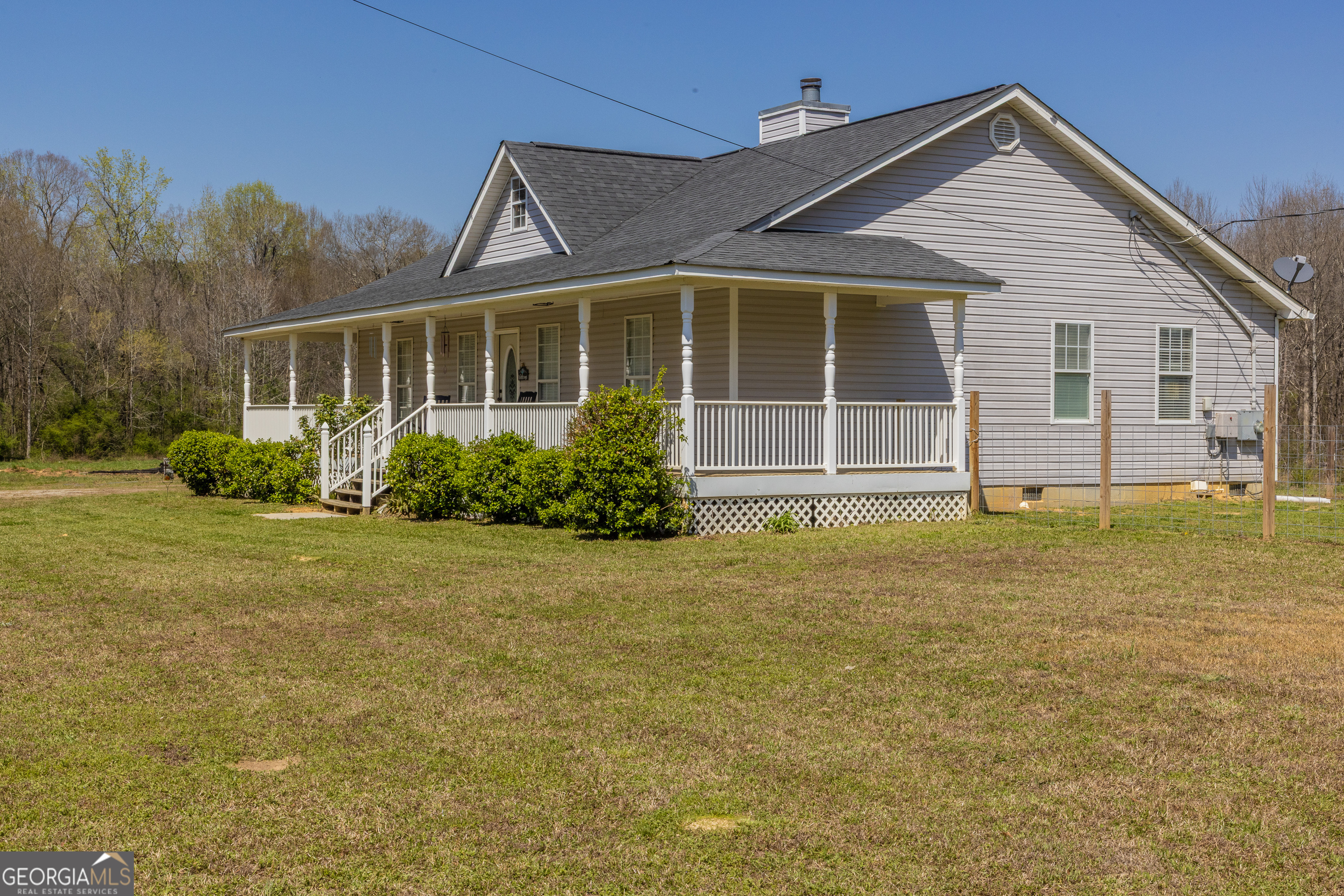 647 Pine Valley Road Meansville, GA 30256 - Photo 79 of 92 a front view of a house with garden