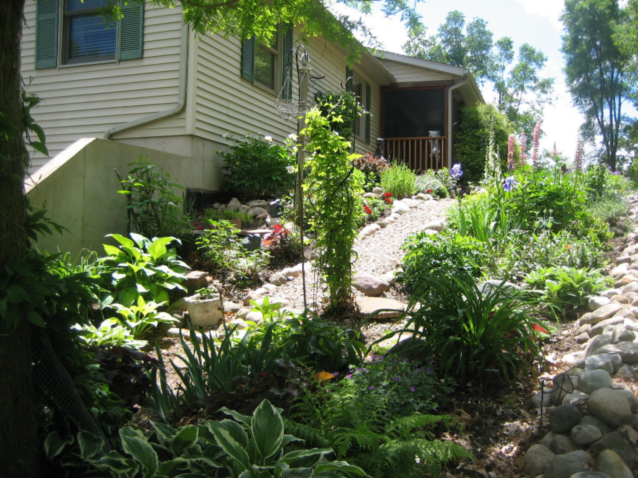 21710 13 Mile Road Bellevue, MI 49021 - Photo 9 of 42 front garden