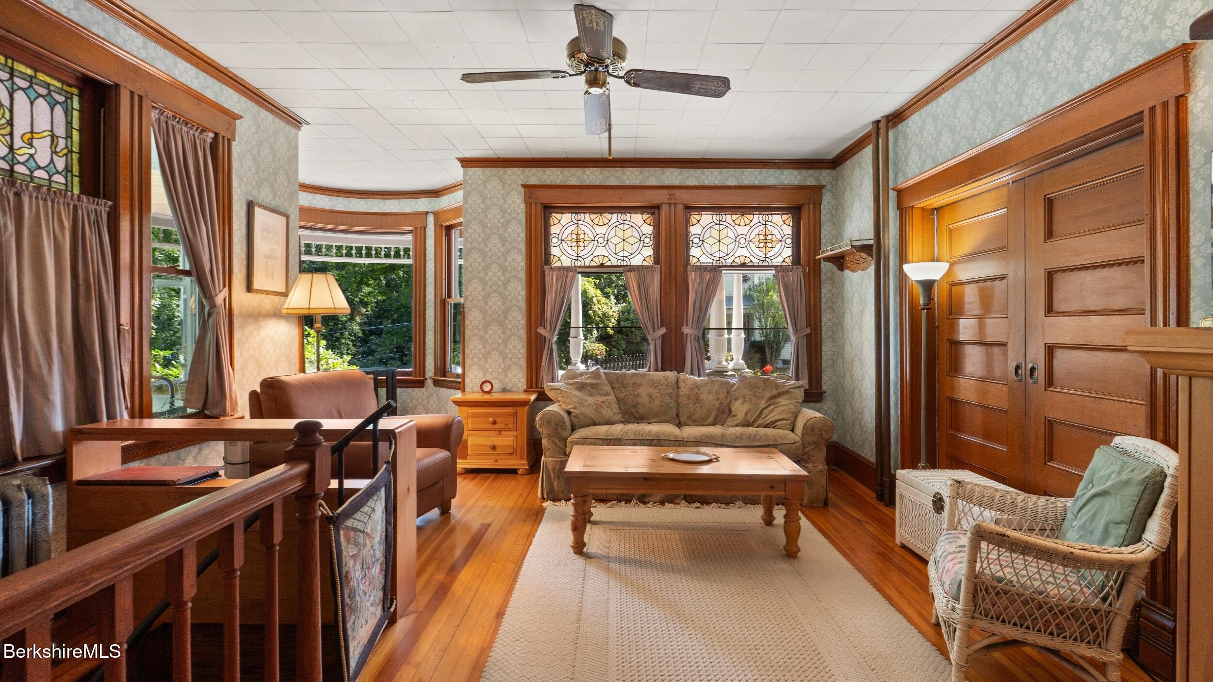 211 Cottage Street Great Barrington, MA 01236 - Photo 12 of 53 a living room with furniture and a large window
