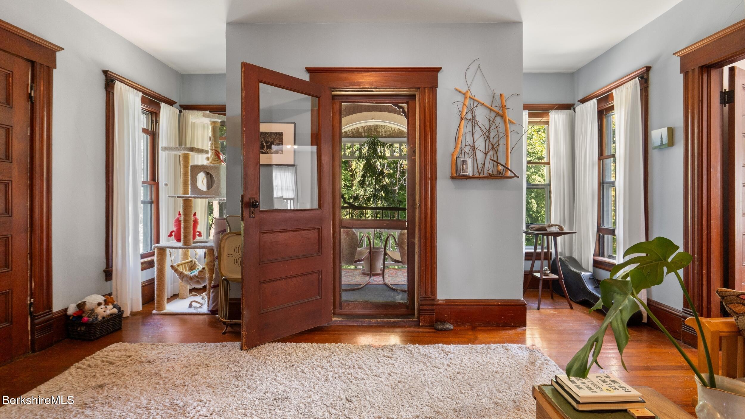 211 Cottage Street Great Barrington, MA 01236 - Photo 13 of 53 a view of livingroom with furniture wooden floor and windows