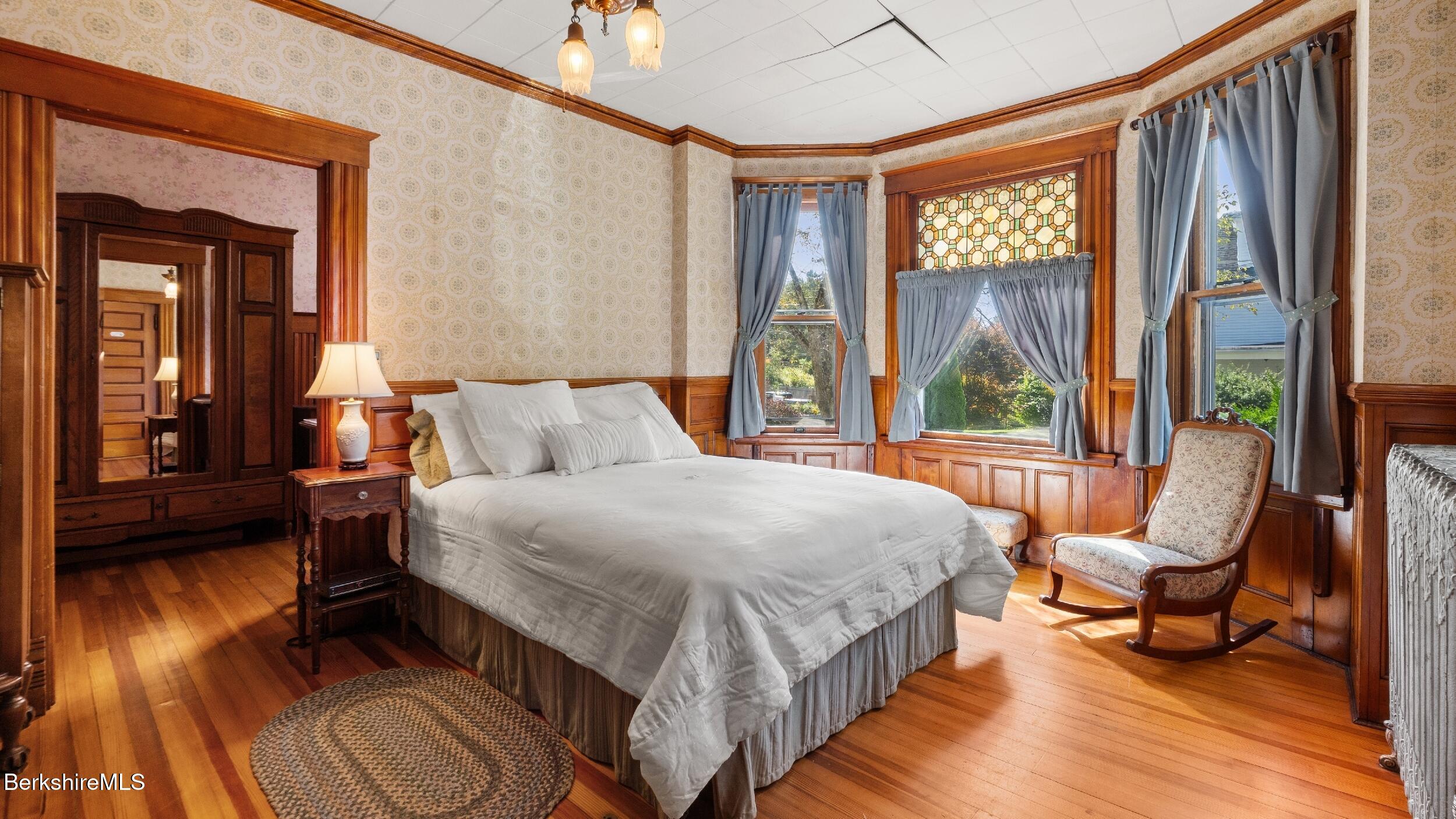 211 Cottage Street Great Barrington, MA 01236 - Photo 15 of 53 a bedroom with a bed and a window