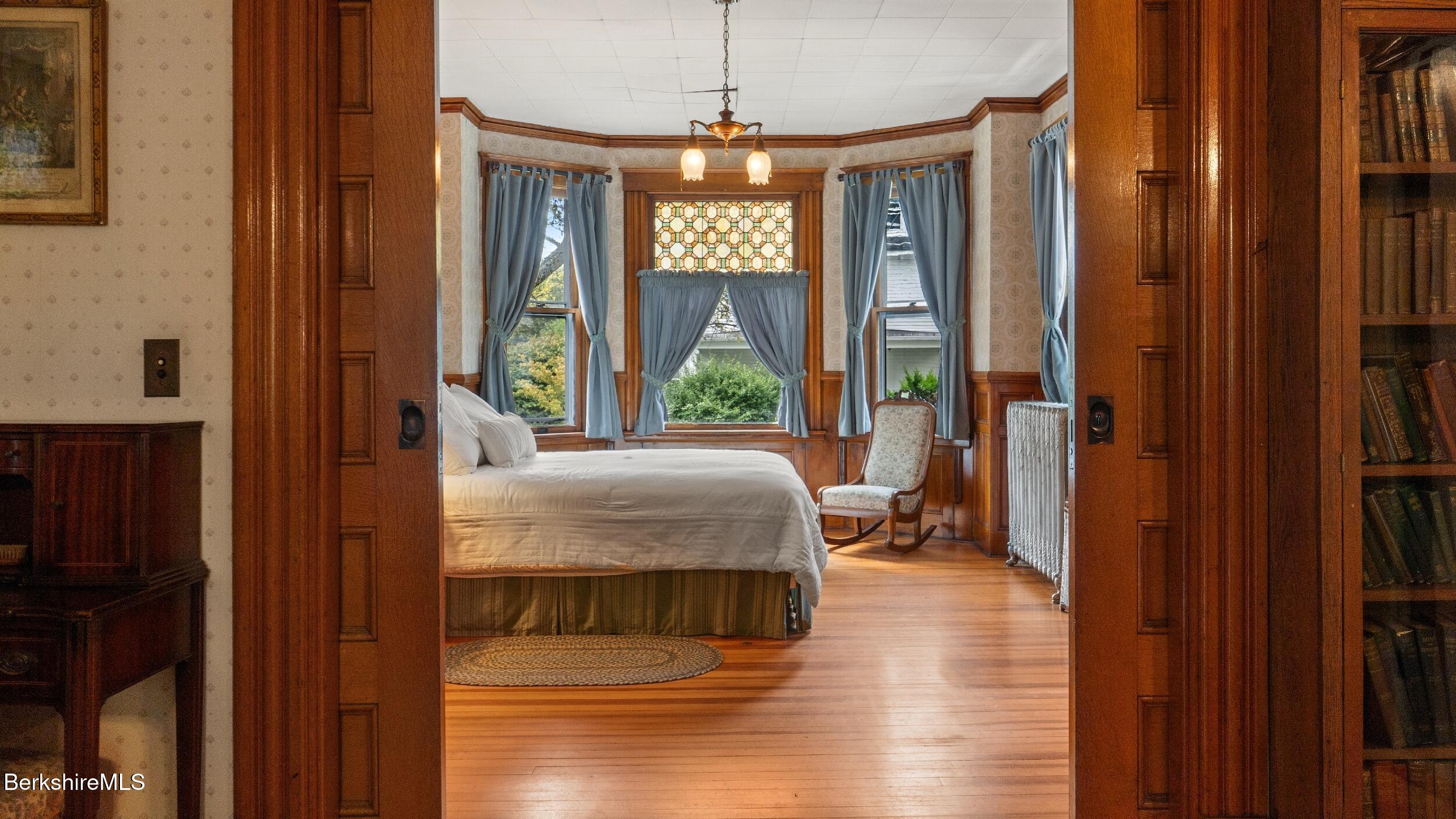 211 Cottage Street Great Barrington, MA 01236 - Photo 16 of 53 a view of an entryway with wooden floor and windows