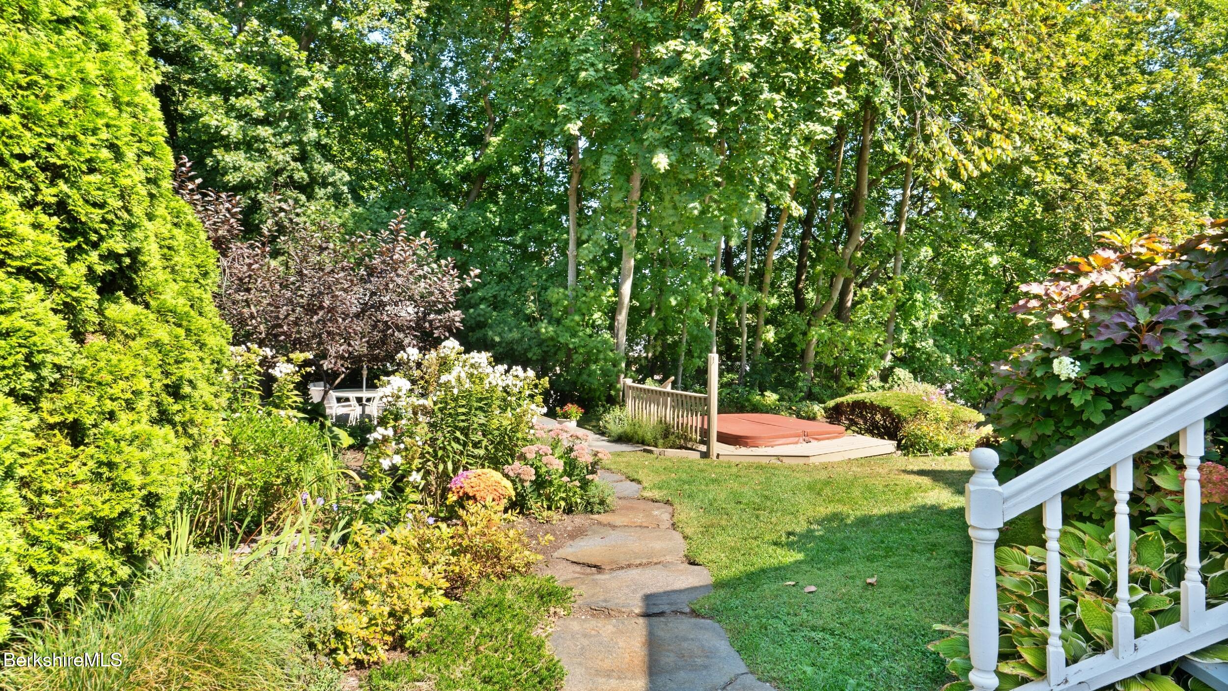 211 Cottage Street Great Barrington, MA 01236 - Photo 17 of 53 a green field with lots of trees