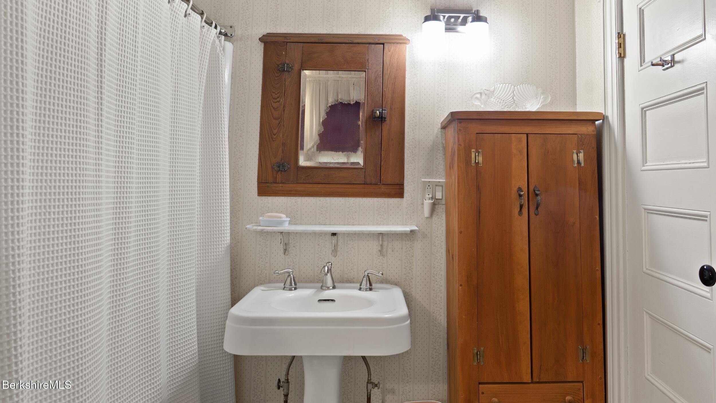 211 Cottage Street Great Barrington, MA 01236 - Photo 21 of 53 a bathroom with a sink and a mirror