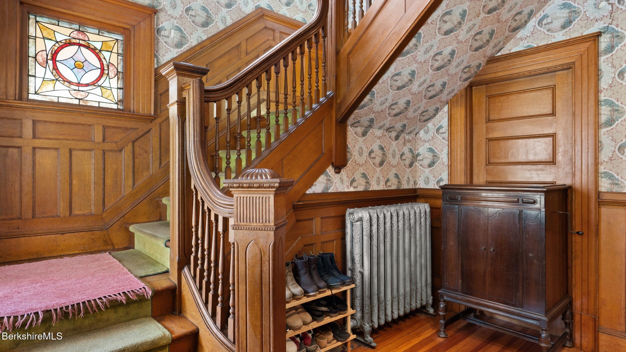 211 Cottage Street Great Barrington, MA 01236 - Photo 26 of 53 a view of staircase with wooden floor and a window
