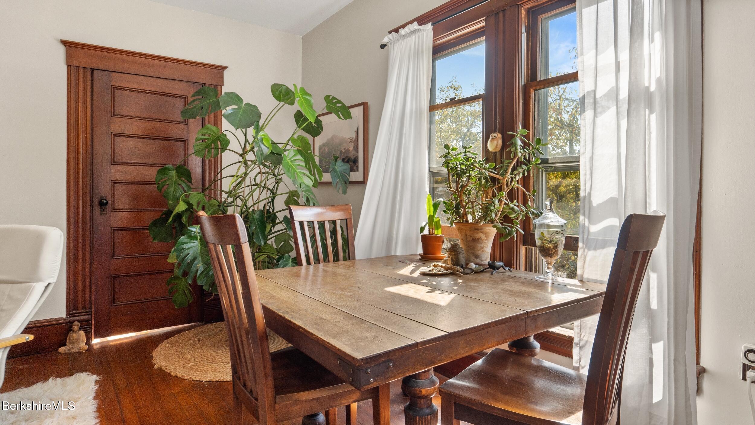 211 Cottage Street Great Barrington, MA 01236 - Photo 29 of 53 a view of a dining room with furniture window and wooden floor