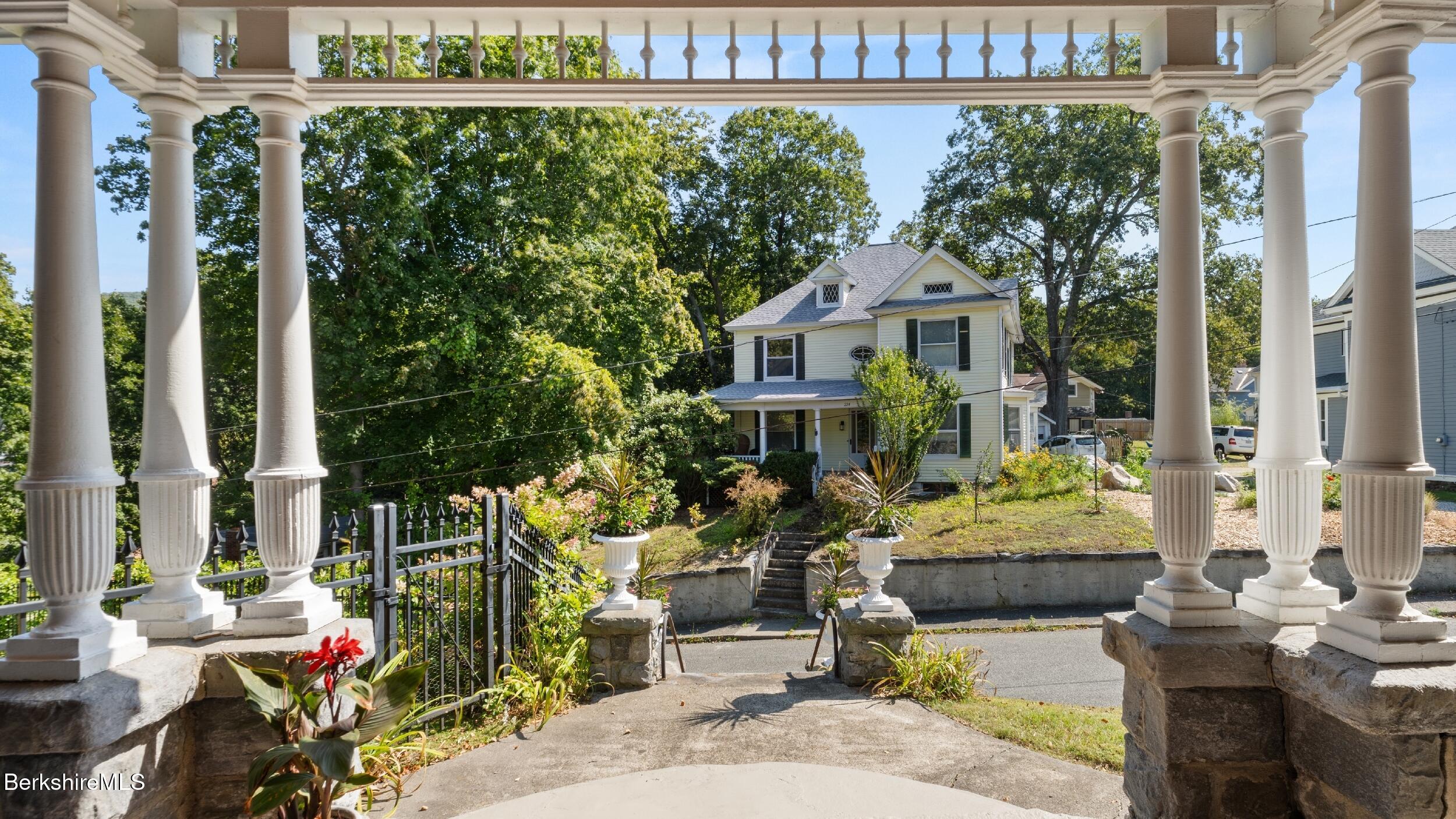 211 Cottage Street Great Barrington, MA 01236 - Photo 38 of 53 a view of a house with backyard sitting area and garden
