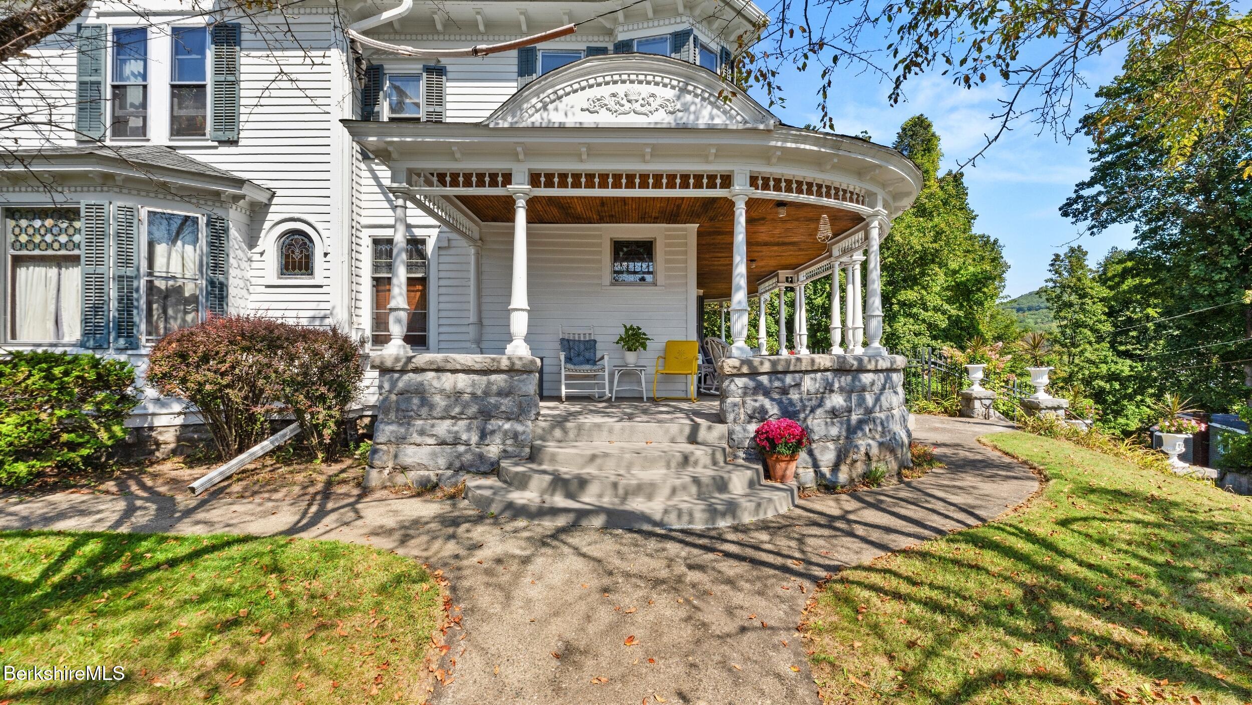 211 Cottage Street Great Barrington, MA 01236 - Photo 44 of 53 front view of a house with a yard