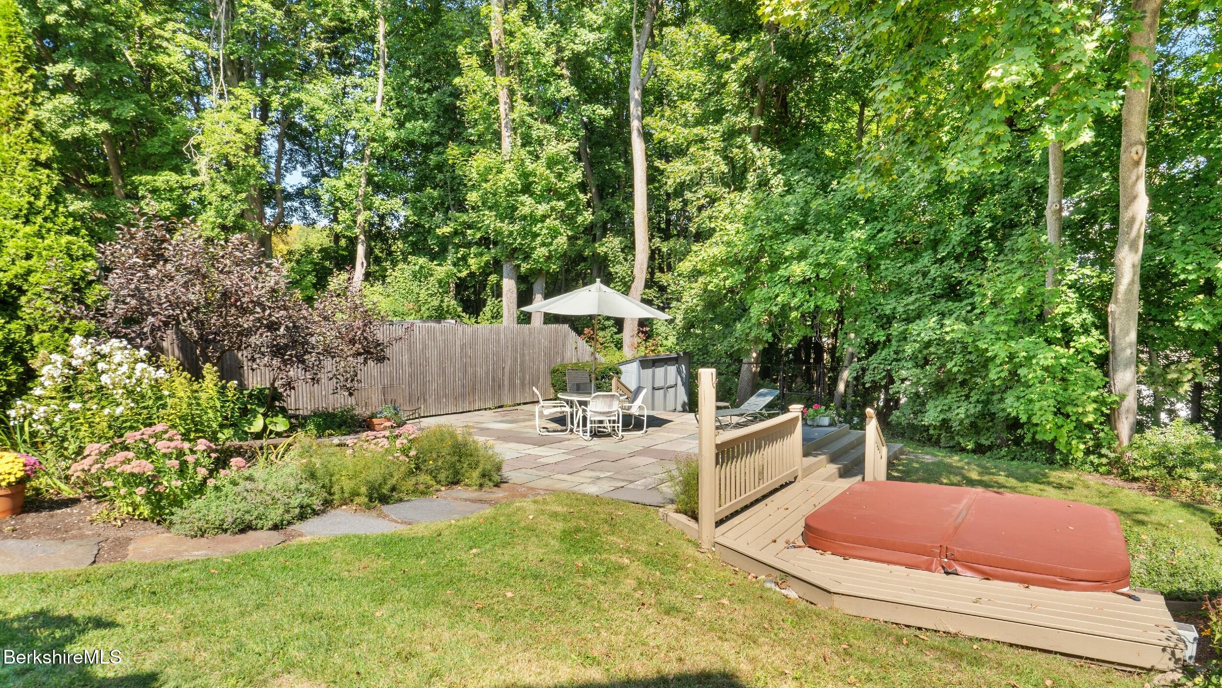 211 Cottage Street Great Barrington, MA 01236 - Photo 48 of 53 a backyard of a house with table and chairs