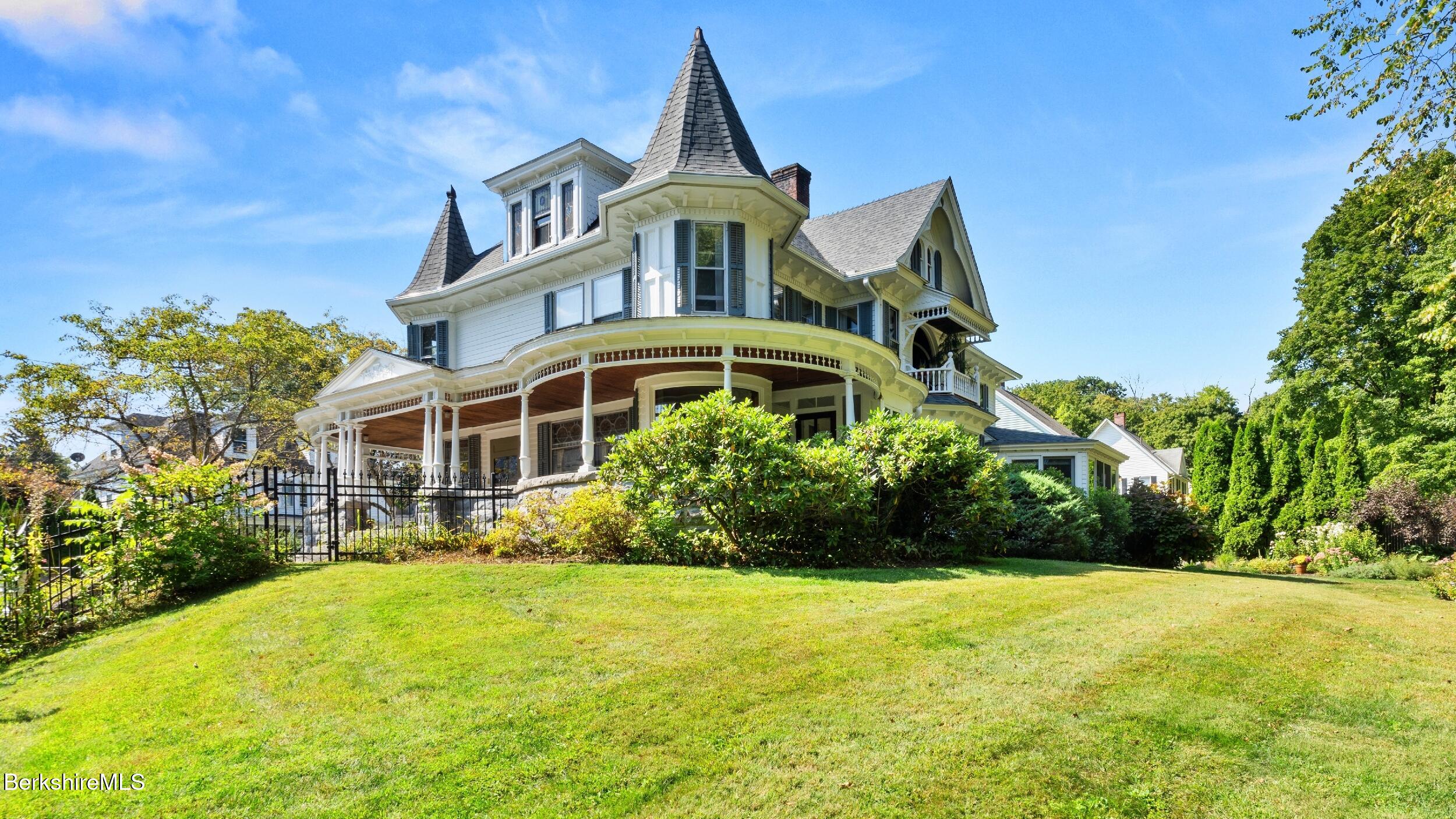 211 Cottage Street Great Barrington, MA 01236 - Photo 49 of 53 a front view of a house with a yard