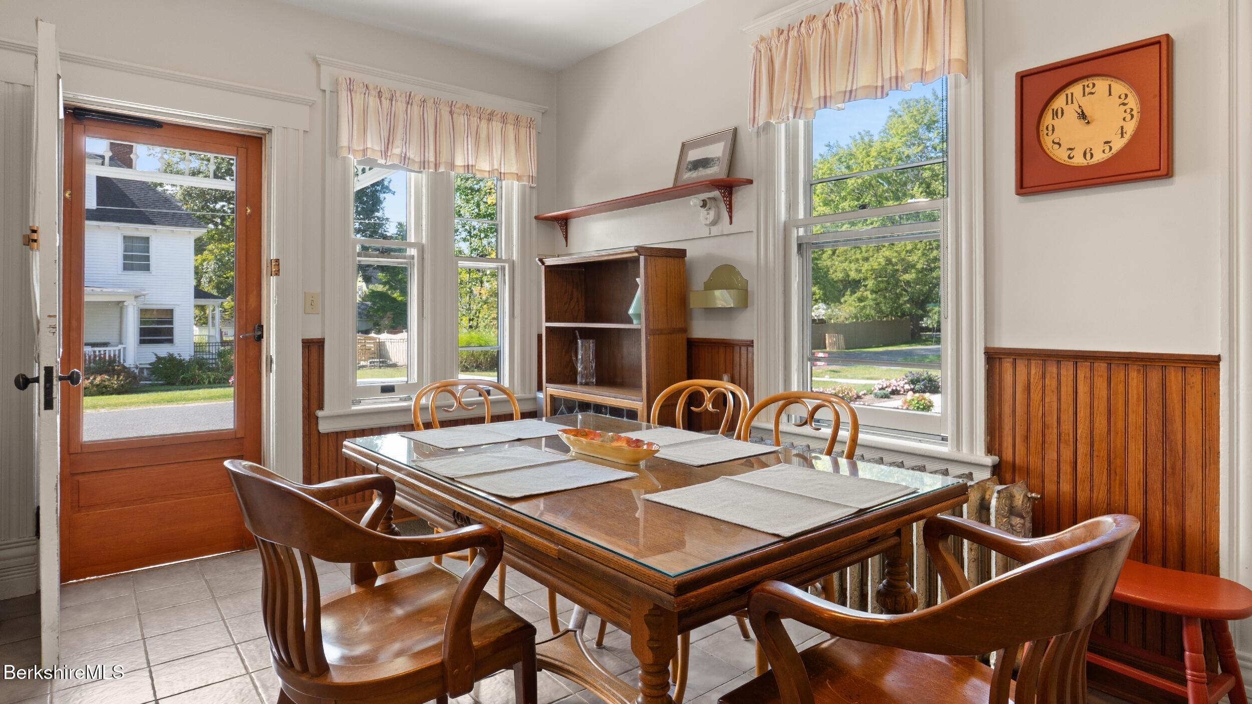 211 Cottage Street Great Barrington, MA 01236 - Photo 5 of 53 a view of a dining room and livingroom with furniture