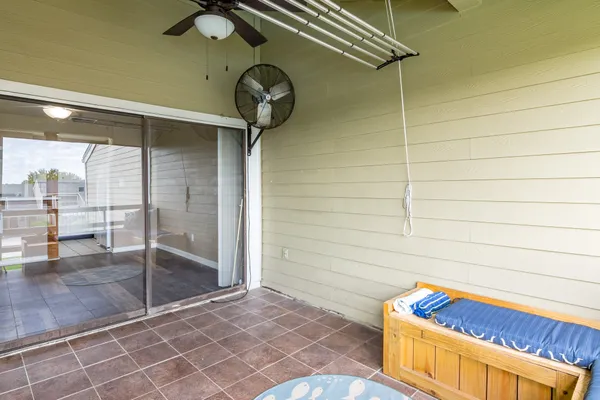 a view of a door and wooden floor
