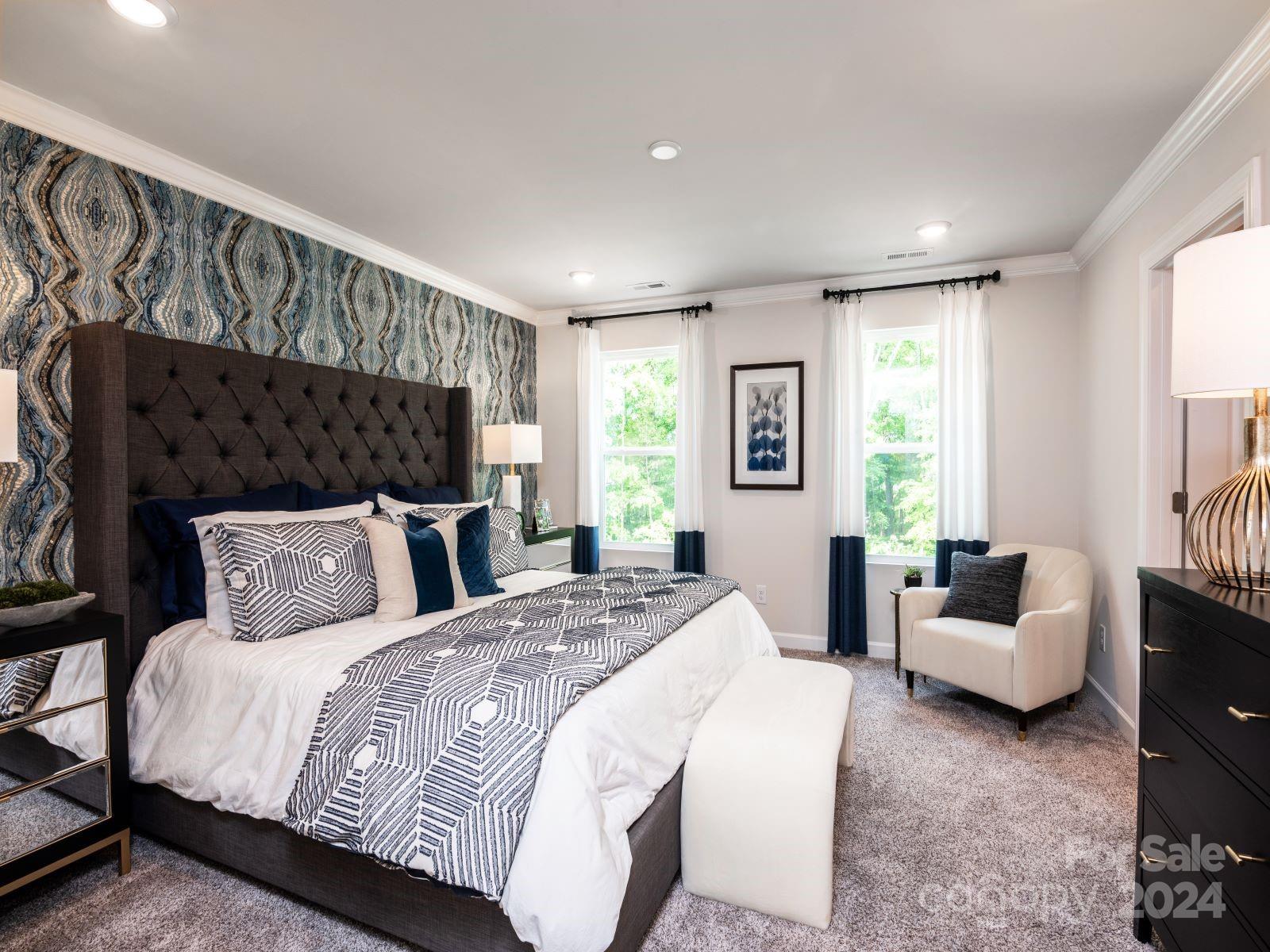 321 Cranford Drive Pineville, NC 28134 - Photo 11 of 14 a bedroom with a bed and glass window