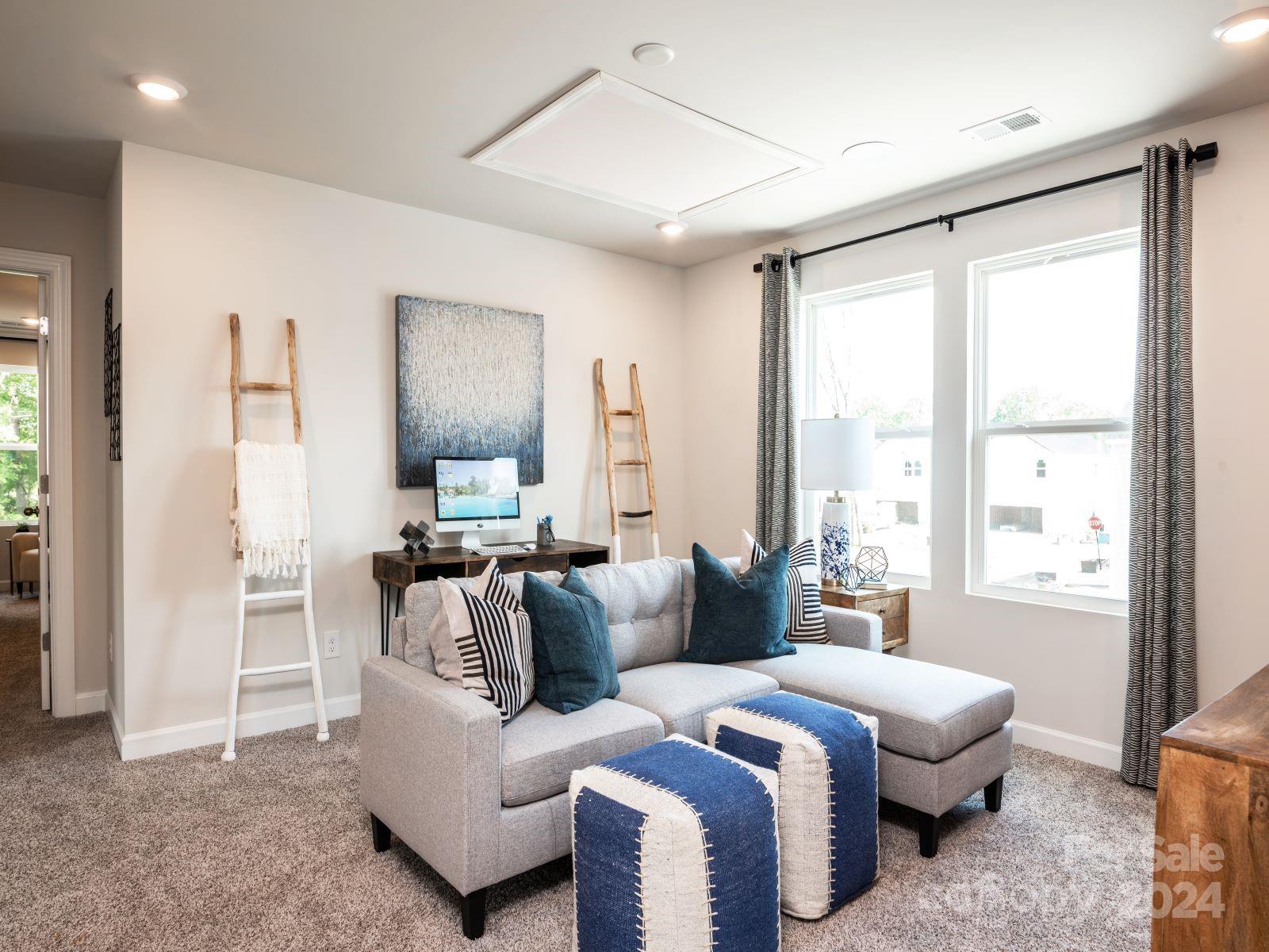 321 Cranford Drive Pineville, NC 28134 - Photo 7 of 14 a living room with furniture and a large window