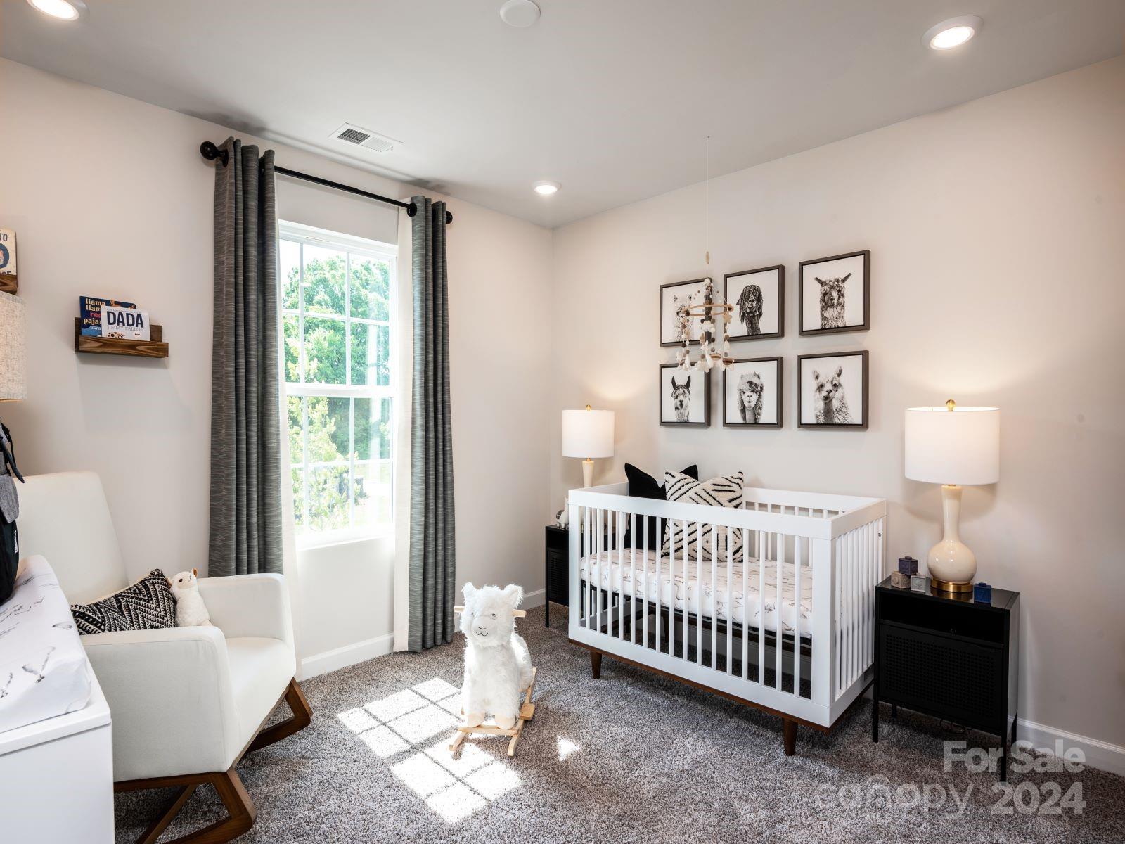 321 Cranford Drive Pineville, NC 28134 - Photo 8 of 14 a bedroom with a bed and couch