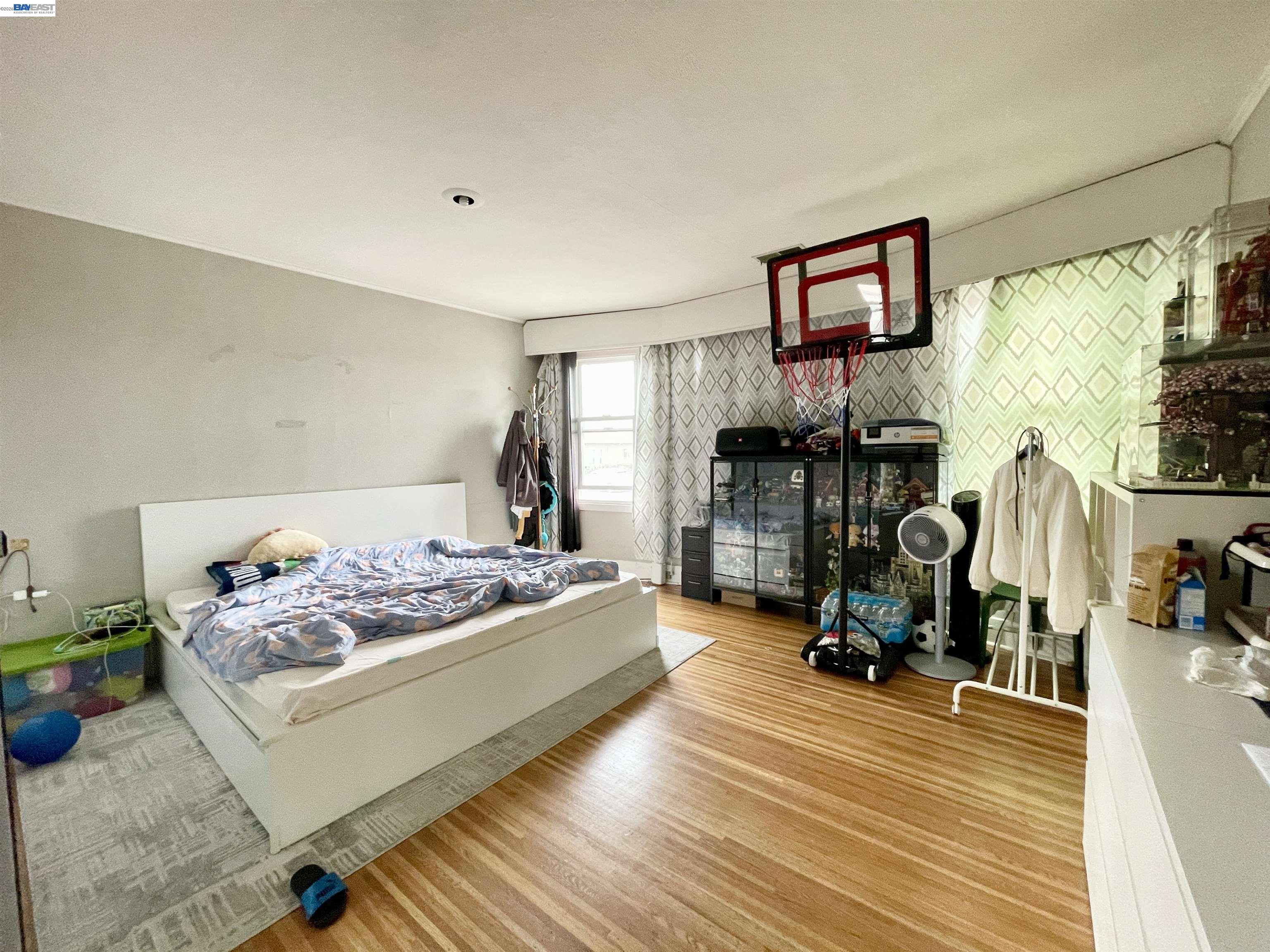 2517 Webb Avenue Alameda, CA 94501 - Photo 5 of 17 a bedroom with furniture and a bed