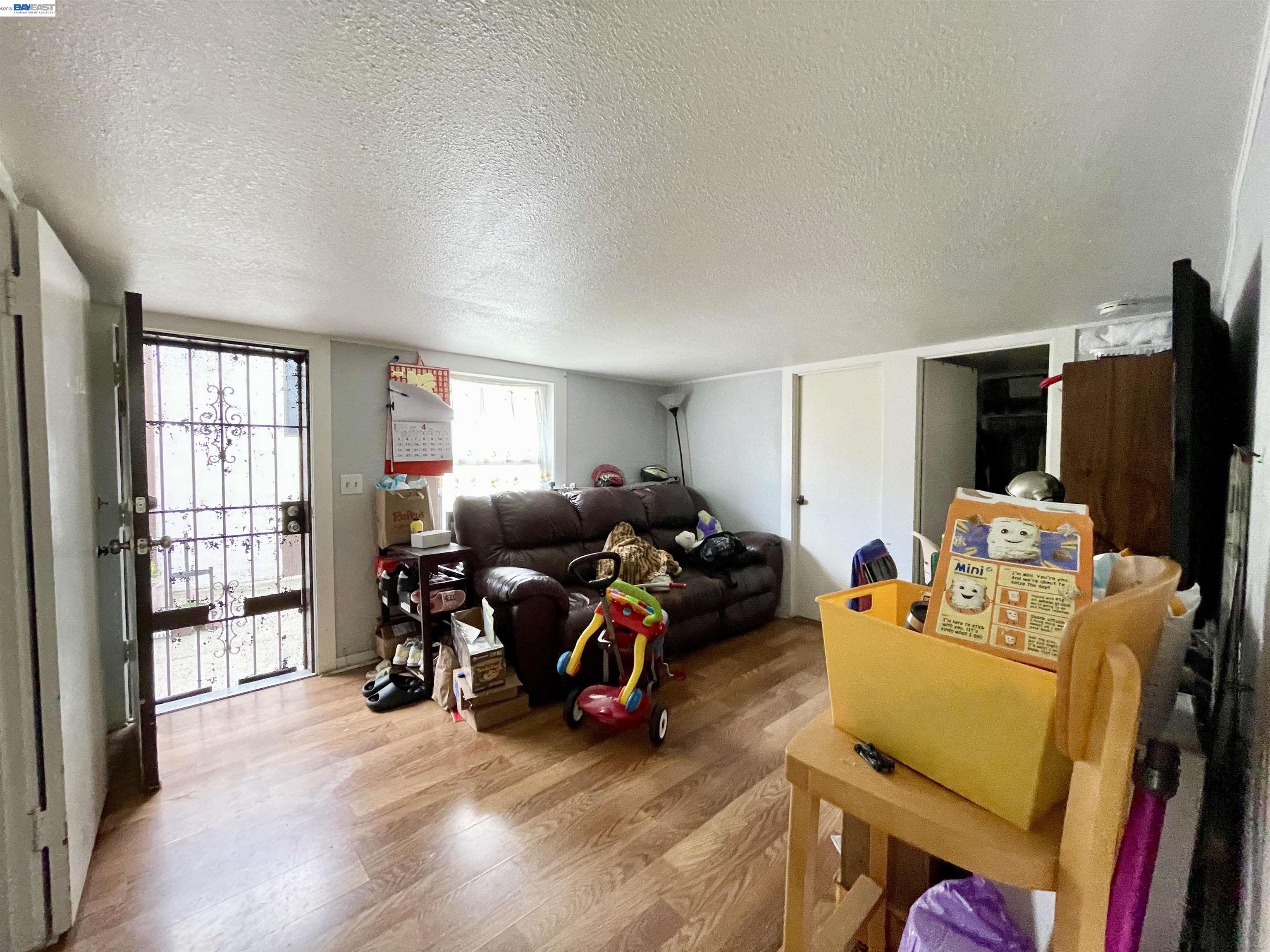 2517 Webb Avenue Alameda, CA 94501 - Photo 9 of 17 a view of a room with furniture and a flat screen tv