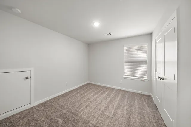 an empty room with a window