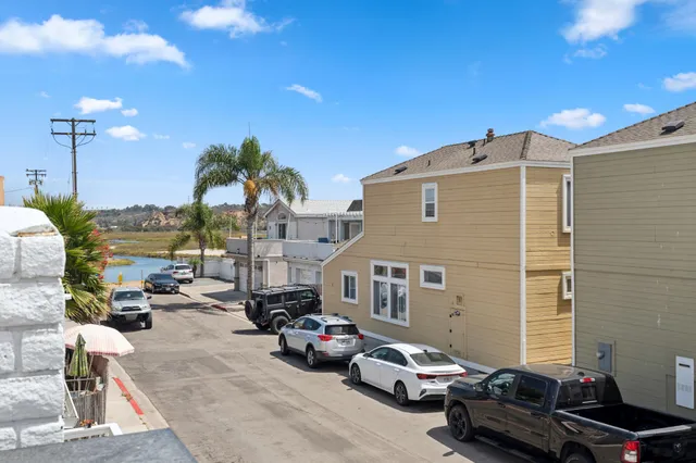 a front view of a house with outdoor seating