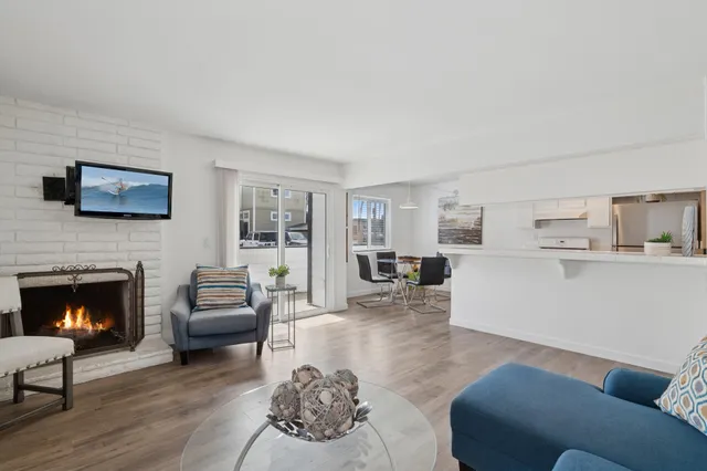 a living room with furniture or fireplace and a fireplace