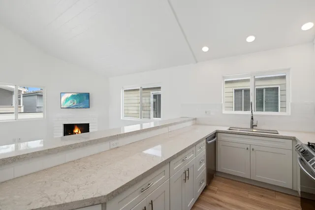 a kitchen with a sink and a window