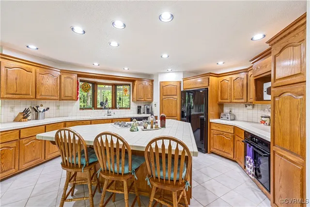 a spacious bedroom with a bed and a window