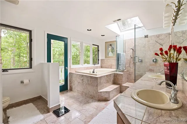 a bedroom with a bed and a cabinet