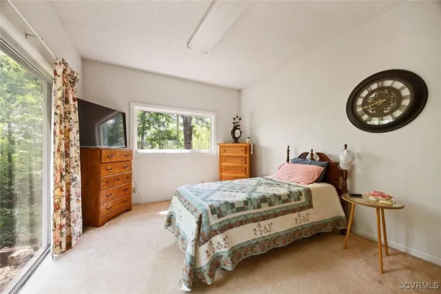 a bathroom with a shower and a sink