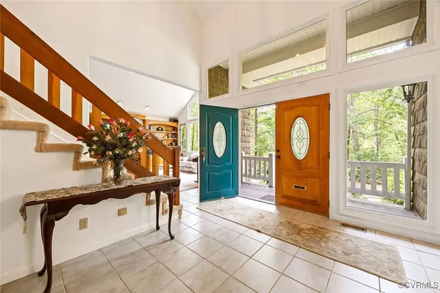 a view of a entryway door with wooden floor