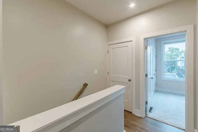 a view of empty room with windows