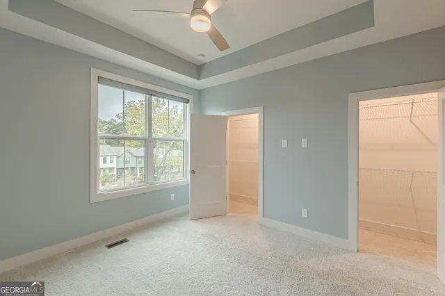 an empty room with a bathroom