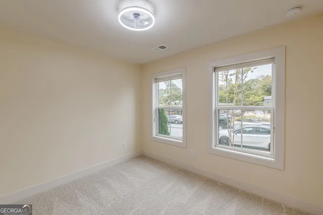 an empty room with windows