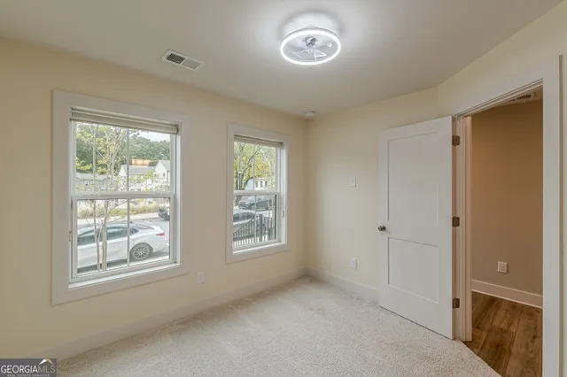 an entryway with a carpet